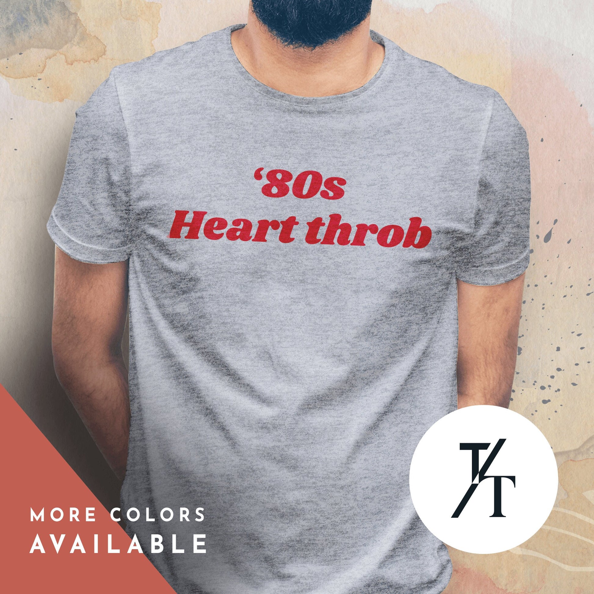 a man wearing a white t - shirt with the words 80&#39;s heart throb