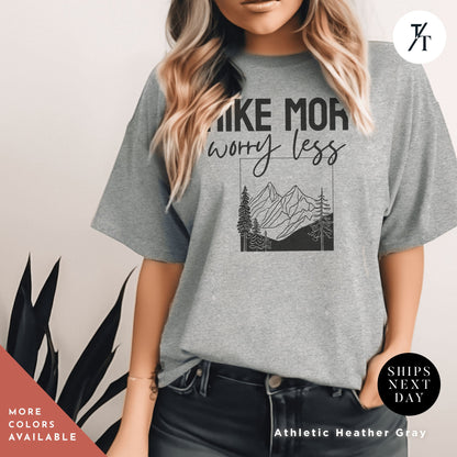 a woman wearing a t - shirt that says make mom worry less