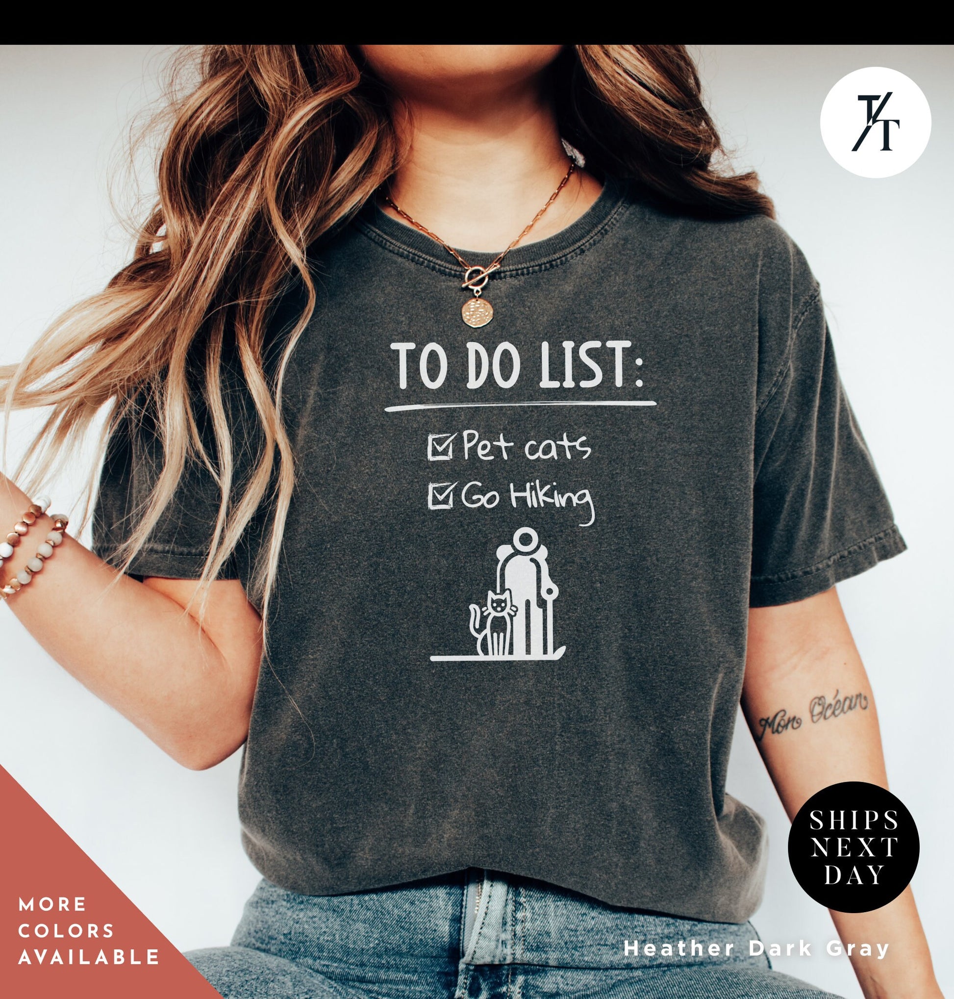a woman wearing a t - shirt that says to do list