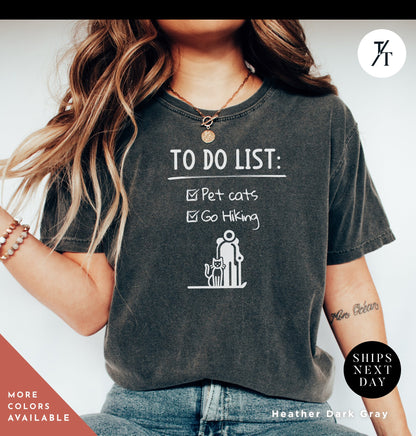 a woman wearing a t - shirt that says to do list