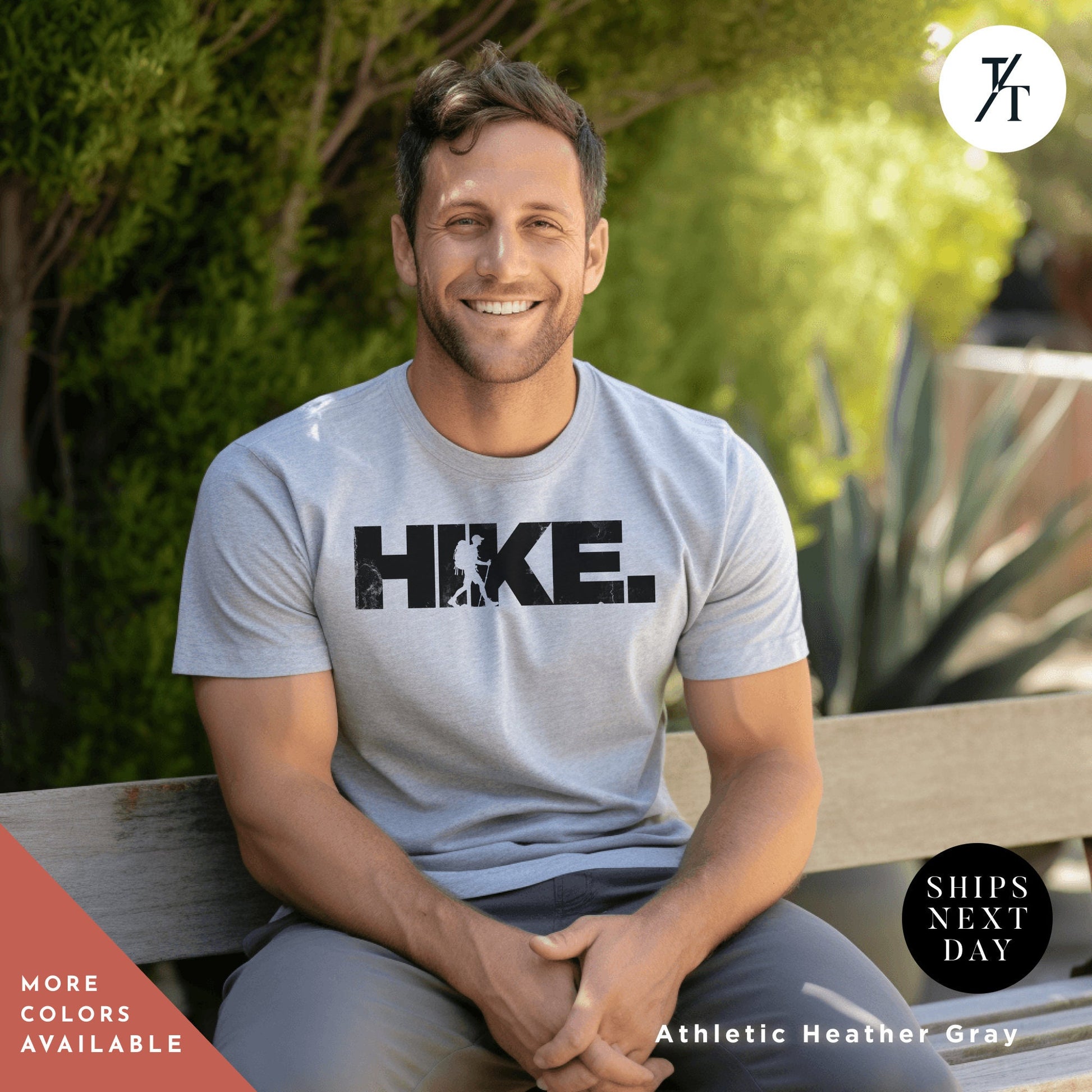 a man is sitting on a bench smiling