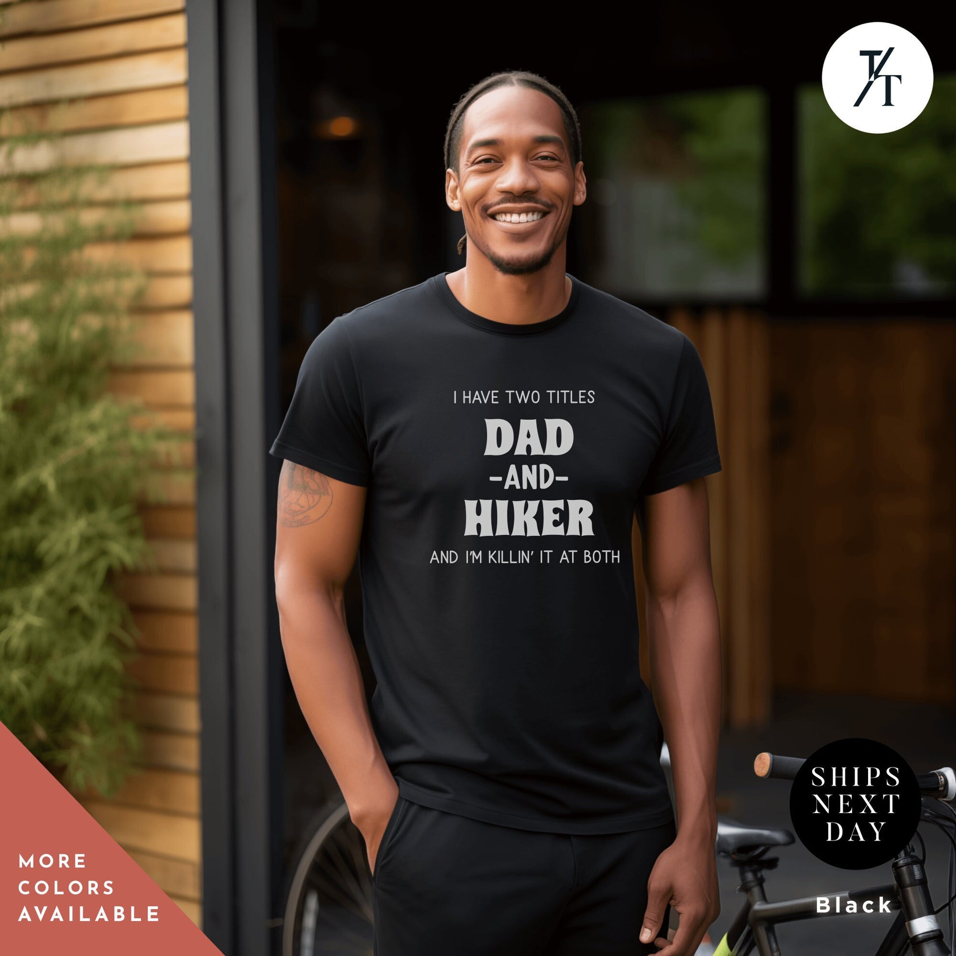 a man wearing a t - shirt that says, i have two titles dad and