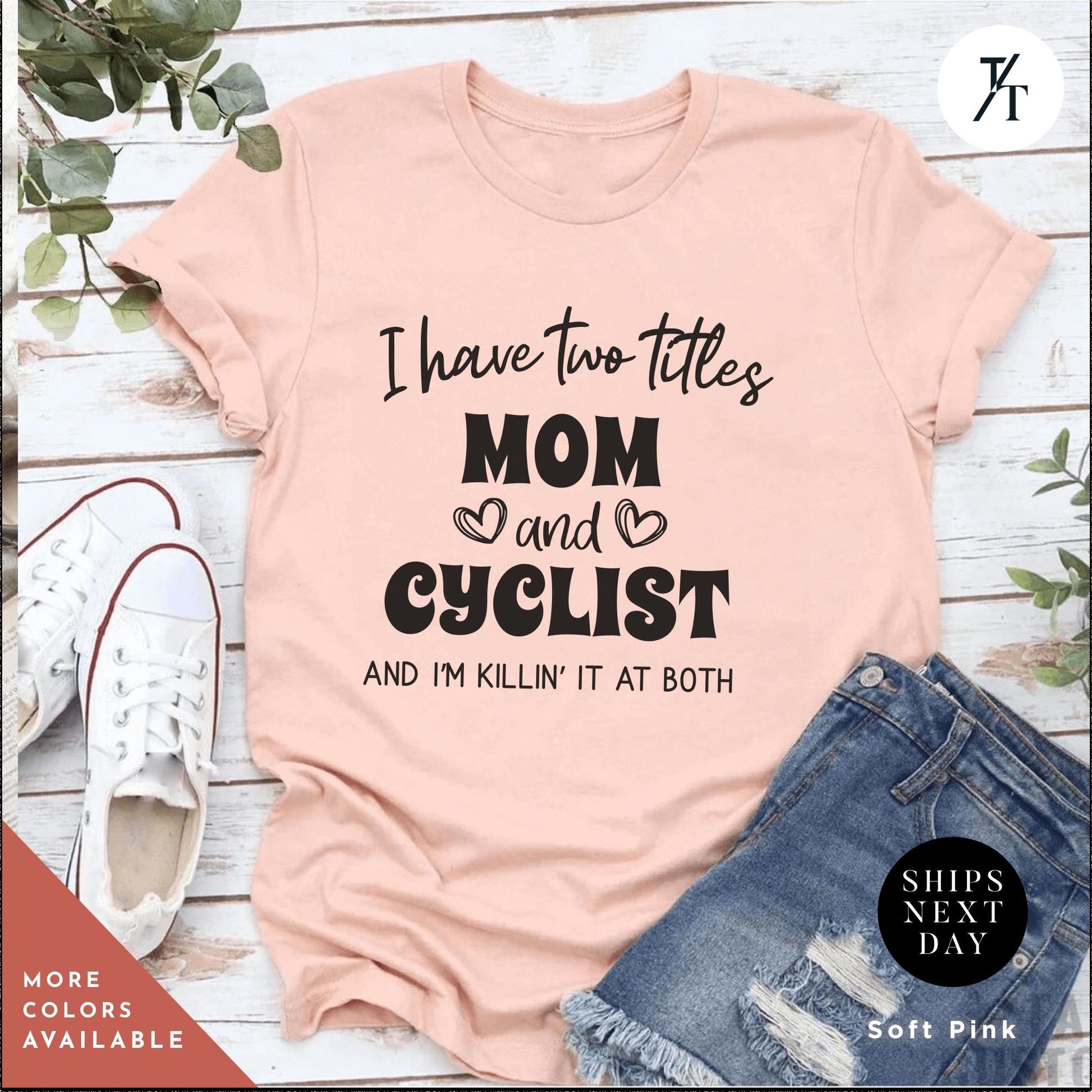 a pink shirt that says i have two titles mom and cyclist and i&#39;m