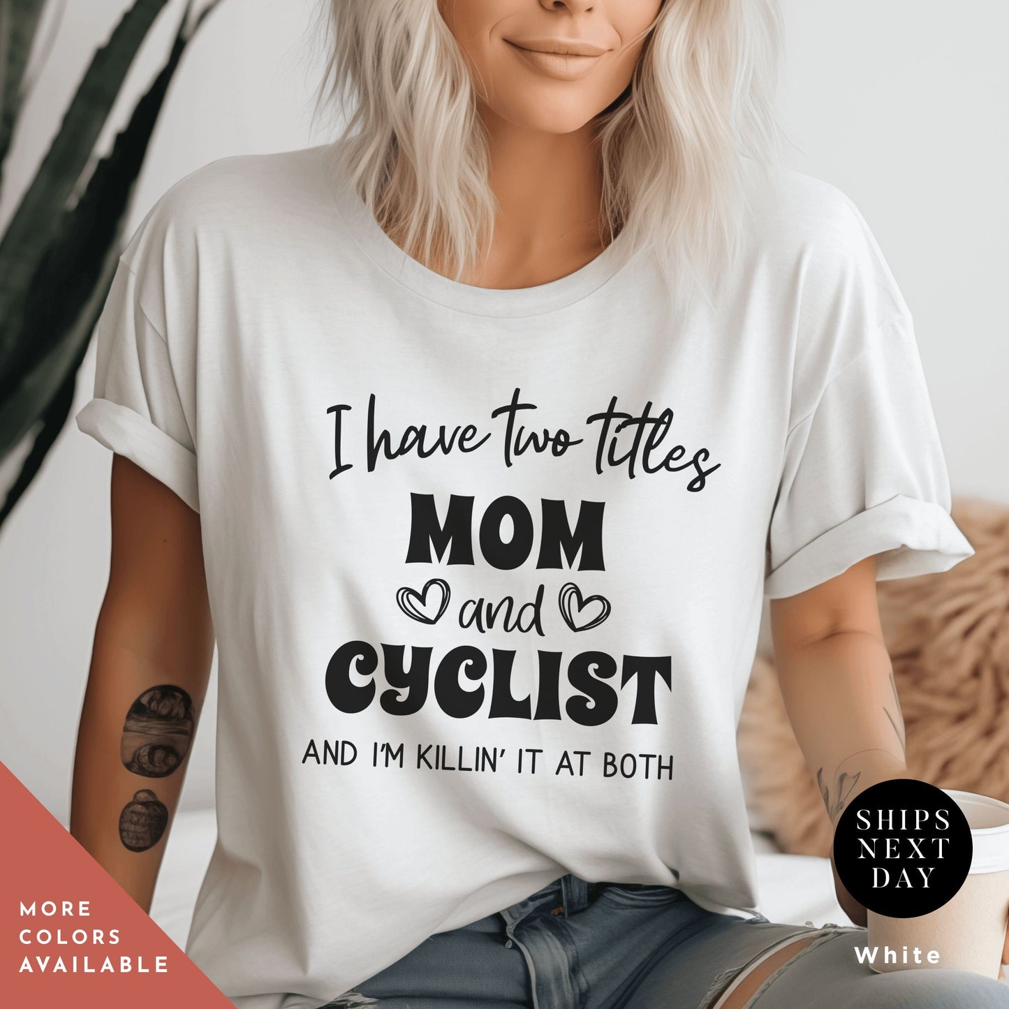 a woman wearing a t - shirt that says i have two titles mom and cyclist