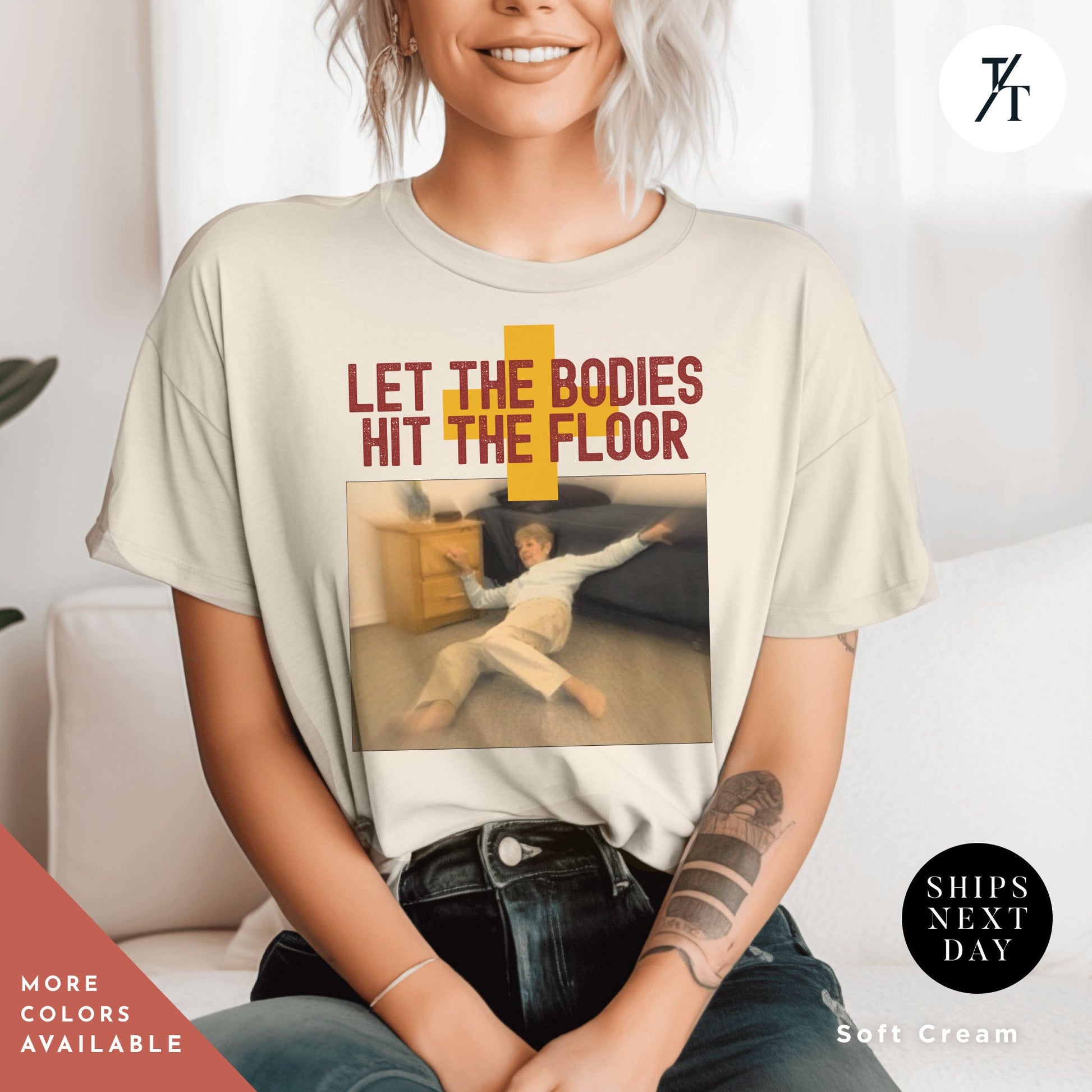 a woman sitting on a couch wearing a t - shirt with a picture of a, let the bodies hit the floor shirt t-shirt, unisex Funny Trending Shirt, Shirts That Go Hard, Gag Gift, Unique Gift, Let The Bodies Tee