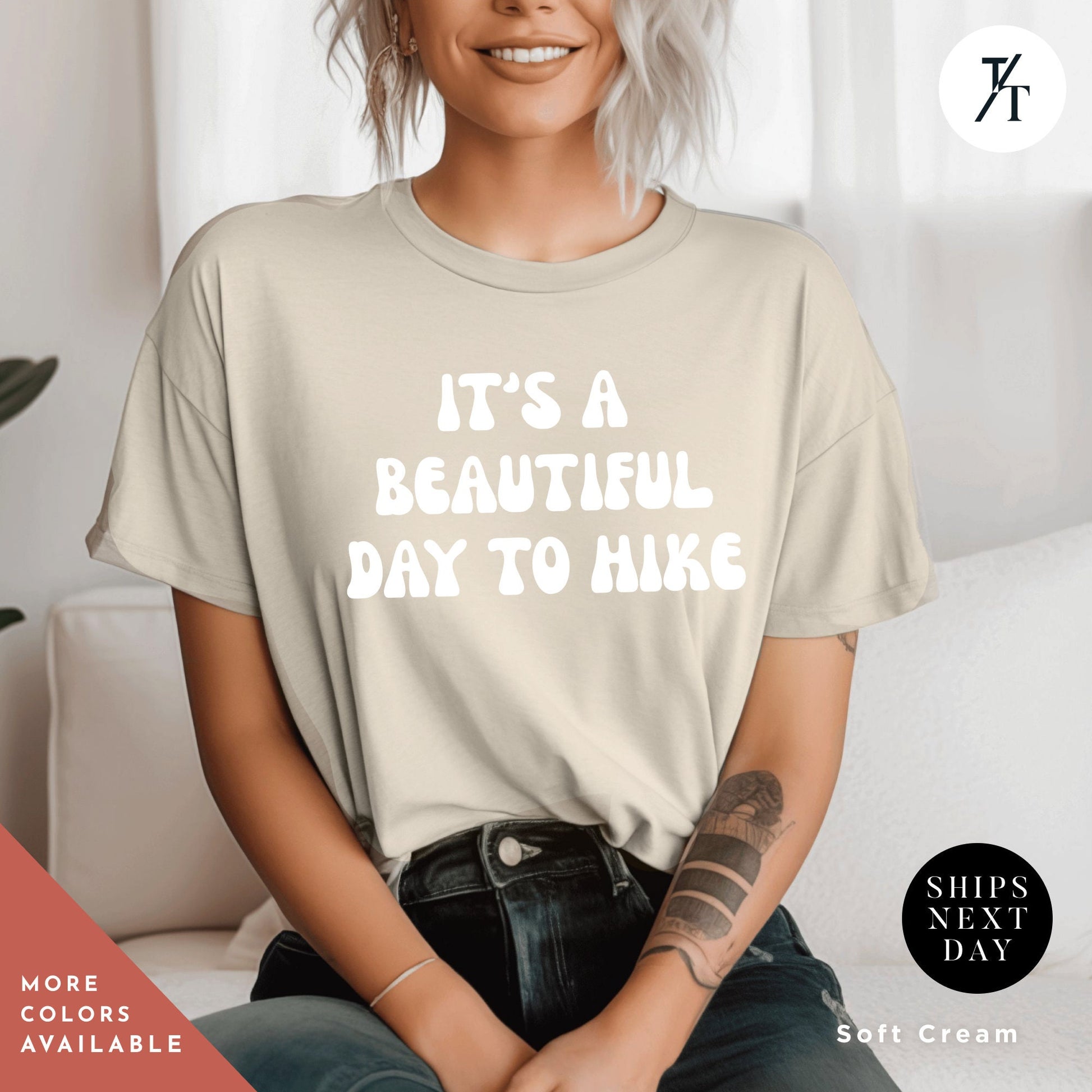 a woman wearing a t - shirt that says it&#39;s a beautiful day to
