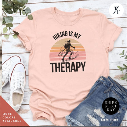 a pink shirt that says hiking is my therapy