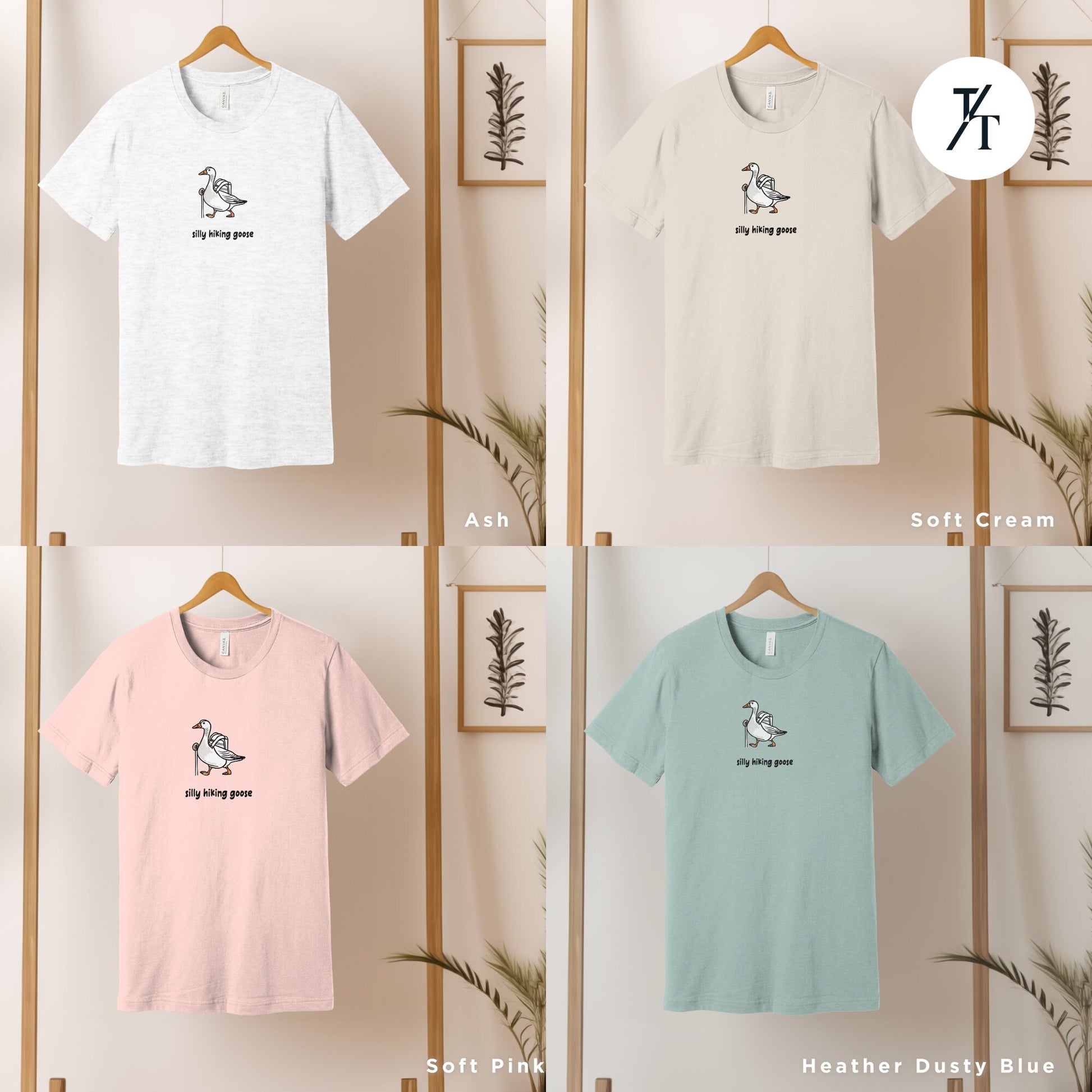 four t - shirts hanging on a wooden rack