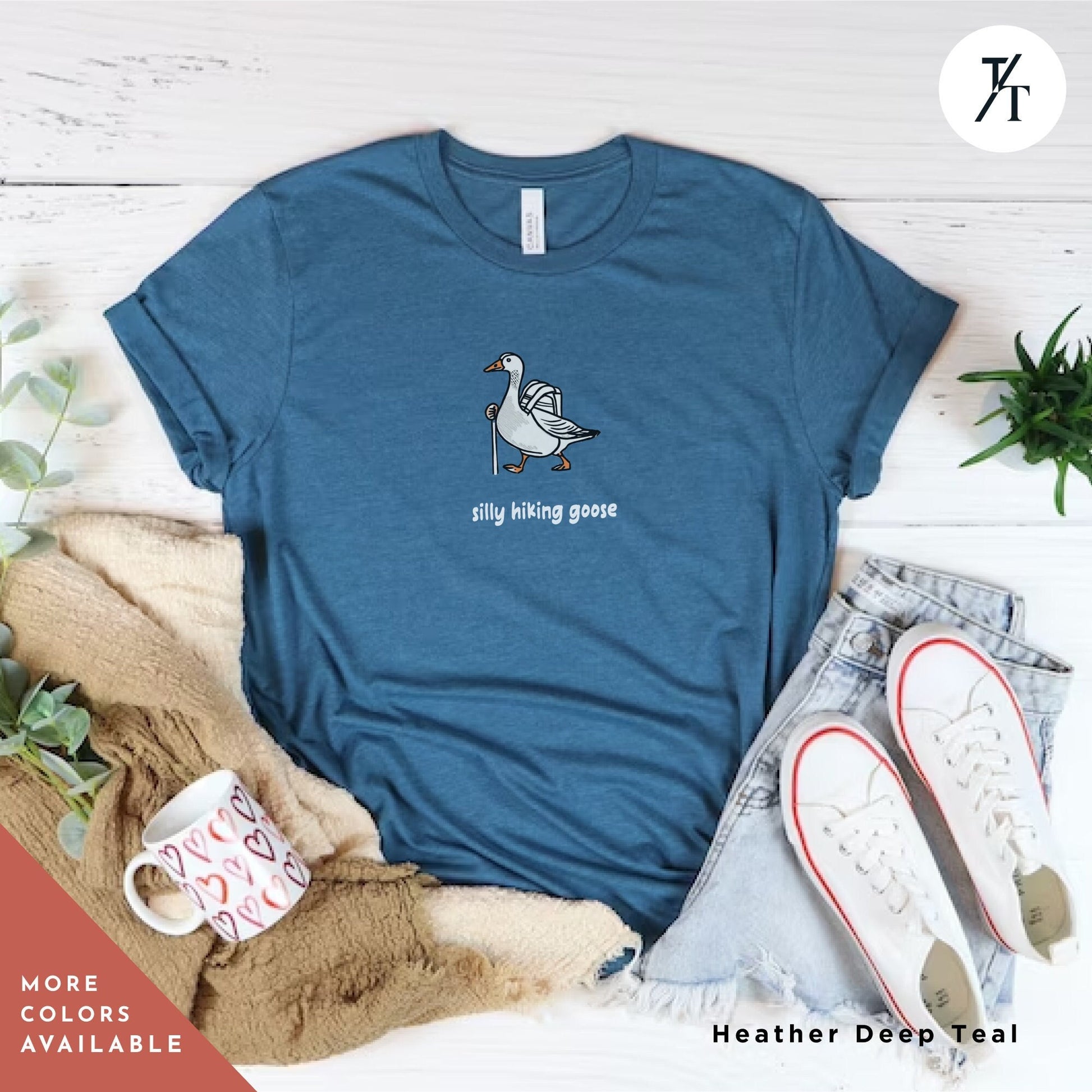 a t - shirt with a picture of a goose on it