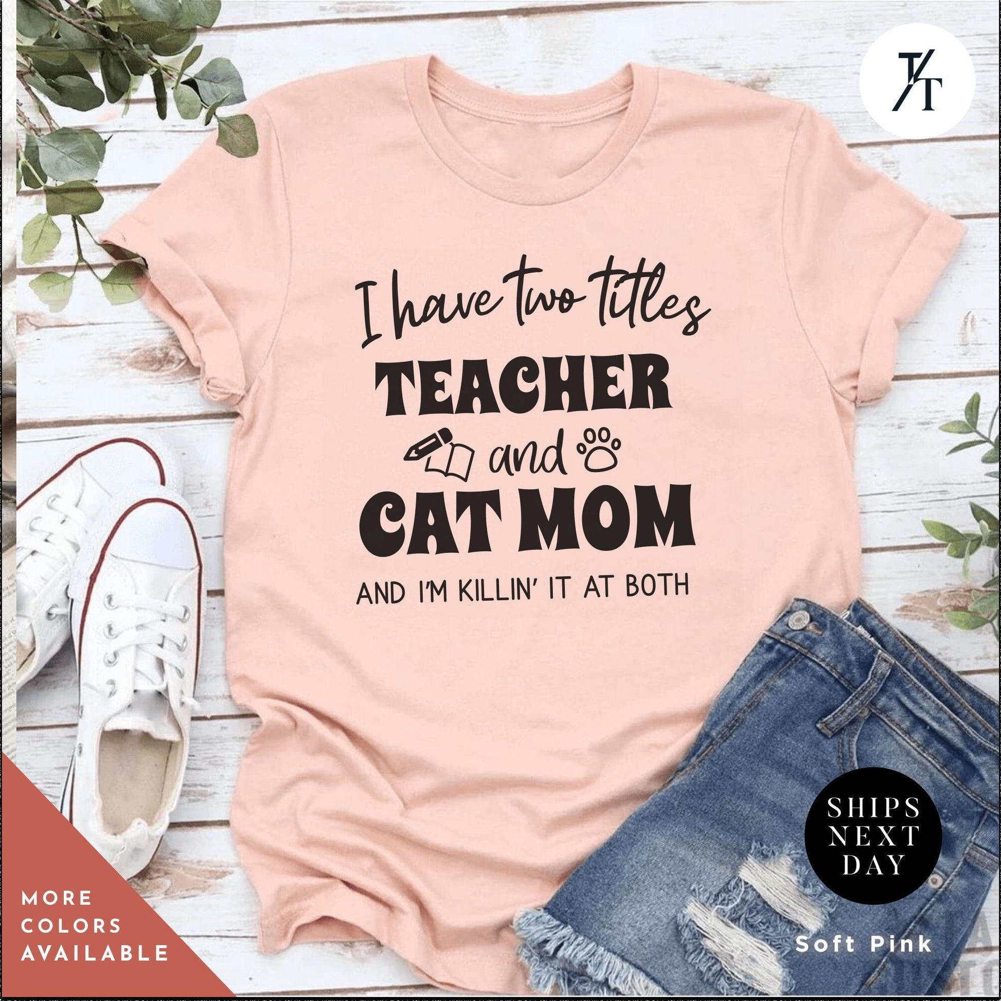 a t - shirt that says i have two titles teacher and cat mom and i