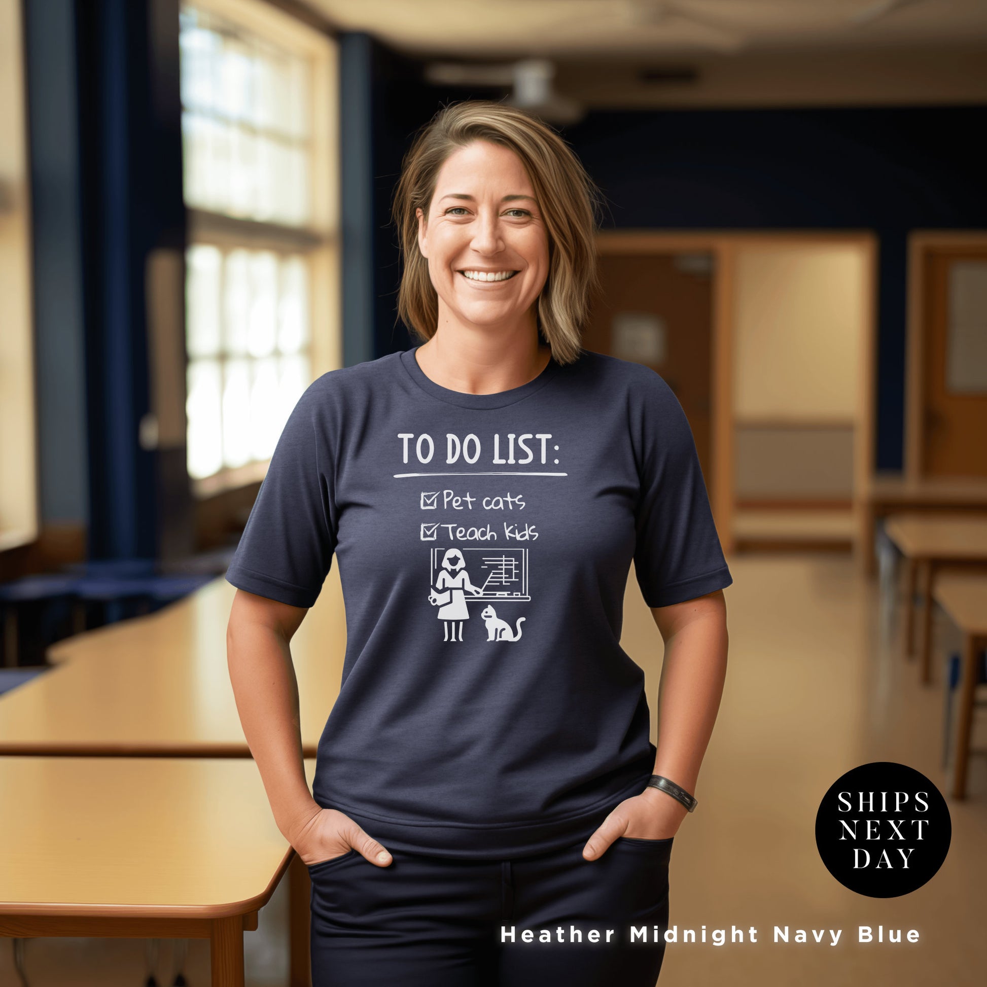 a woman standing in a classroom with her hands on her hips