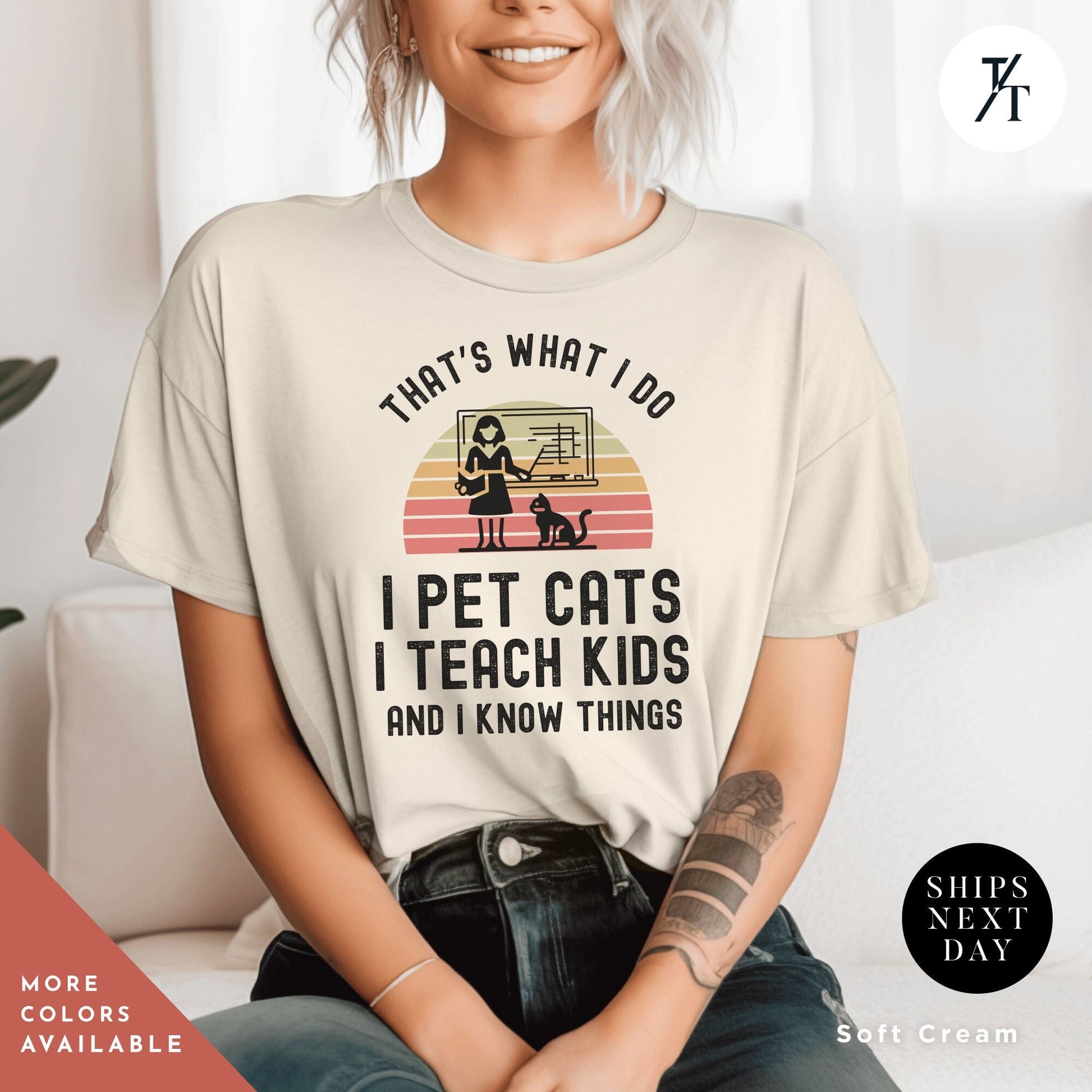 a woman sitting on a couch wearing a t - shirt