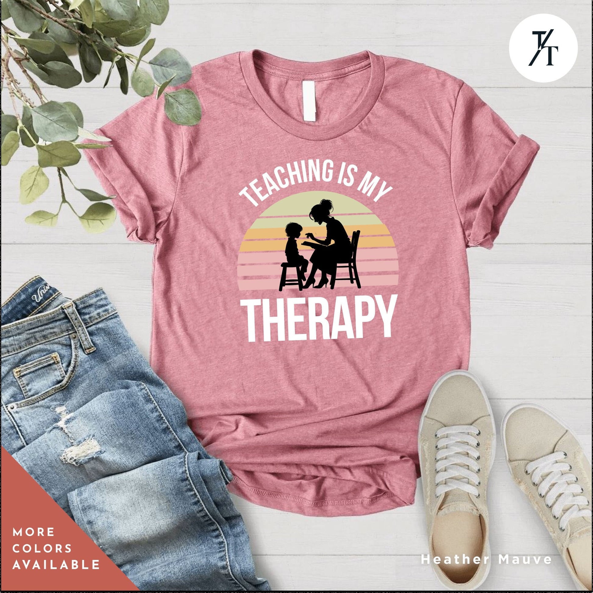 a t - shirt that says teaching is my therapy