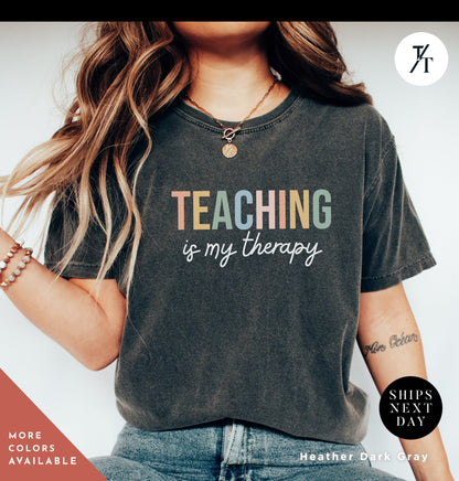a woman wearing a teaching is my therapy shirt, Teacher Team T-Shirt, Teaching is my Therapy, tshirt teacher t shirt best seller, Last Day Of School, Teacher tShirts, Back To School tee
