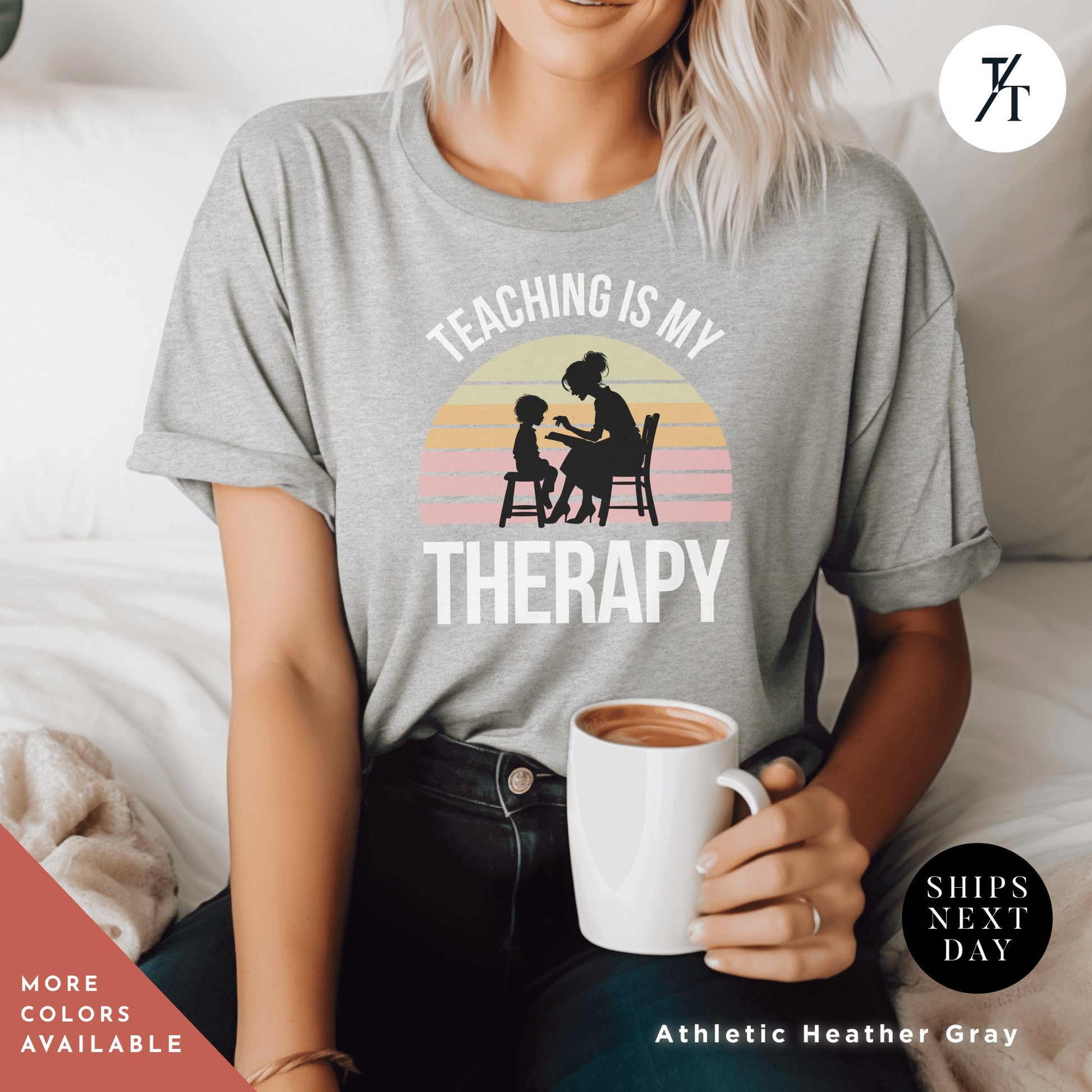 a woman sitting on a bed holding a cup of coffee