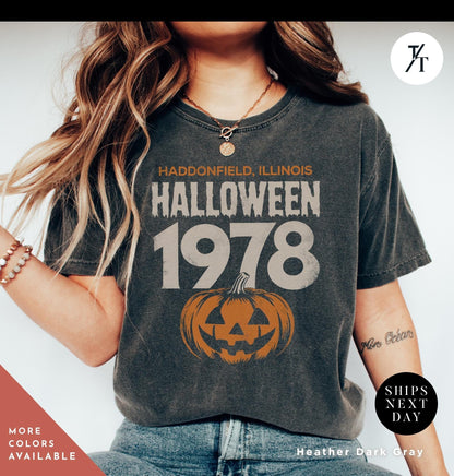 a woman wearing a halloween shirt with a jack - o&#39;- lantern on it, Retro halloween 1978 t-shirt Michael Myers Shirt 1978 Halloween Movie Party Tee, Vintage John Carpenter, Spooky Season Original Scary movie