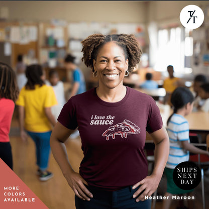 a woman standing in a classroom with her hands on her hips