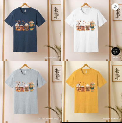 a group of t - shirts hanging on a wall, Cute Fall Pumpkin Coffee Drink Thanksgiving Shirt, Halloween tShirt, Coffee Lover Womens Fall tShirt, Pumpkin Spice tee