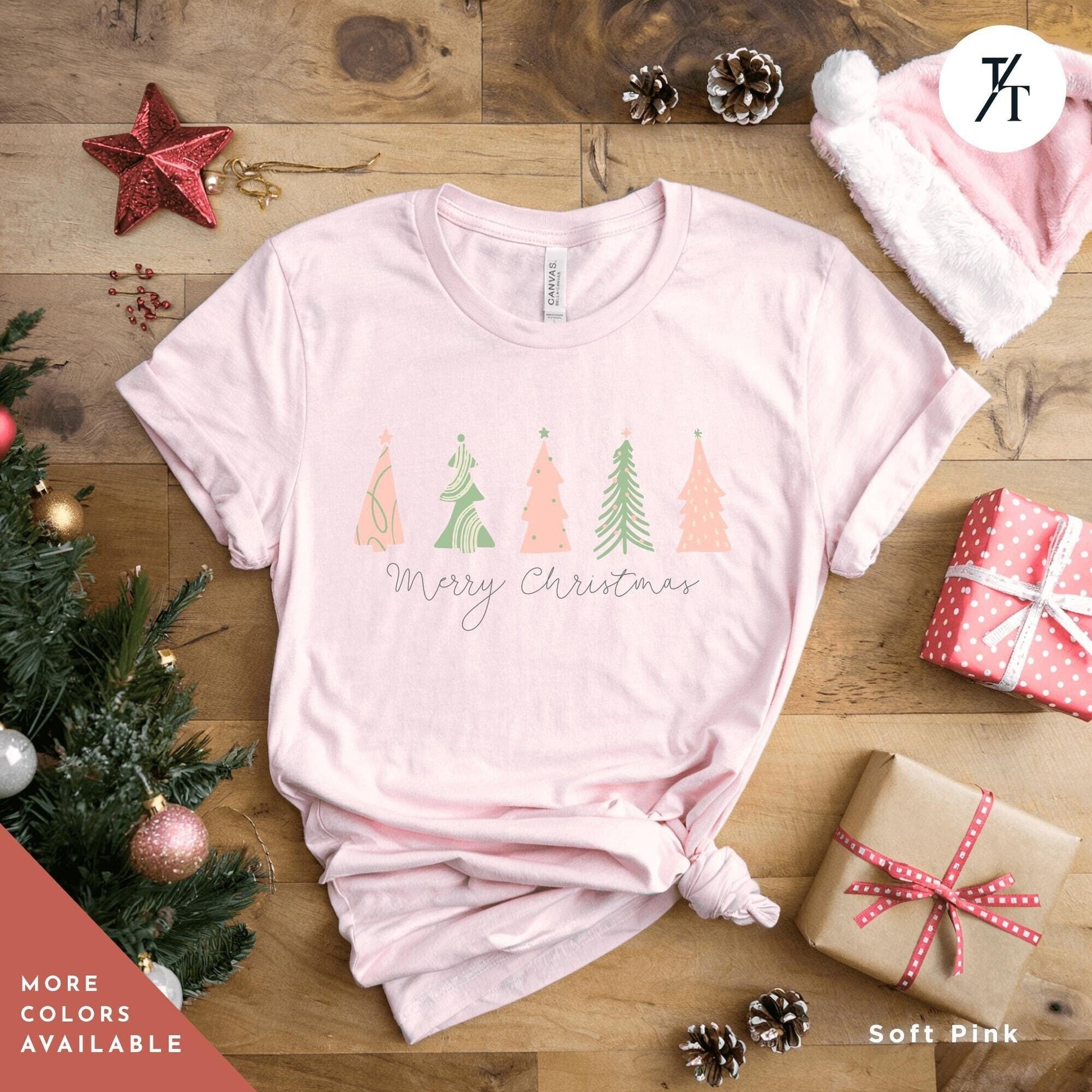 a shirt with 4 pink Christmas trees that says &quot;Merry Christmas&quot; North Pole Christmas Tree Farm Shirt, Coquette Pink Christmas Tree Shirt, Xmas Gift, Farm Fresh Xmas Shirt, Women Holiday Tee