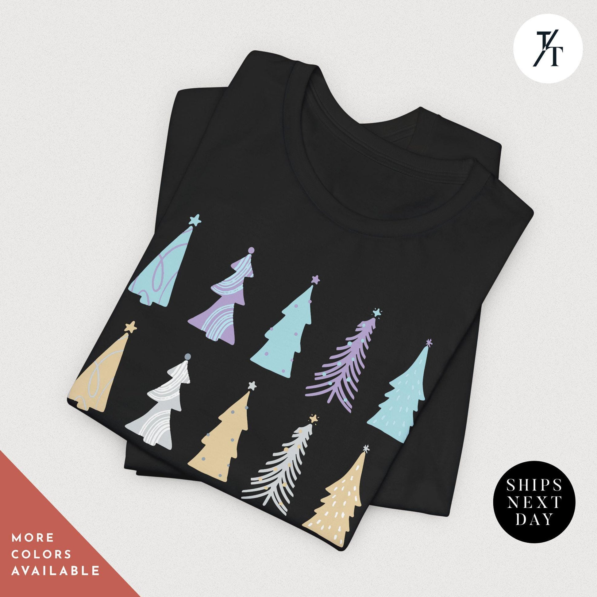a black t - shirt with colorful christmas trees on it, Coquette Christmas Tree Shirt, Pine Tree Watercolor tee, North Pole Christmas Farm Shirt, Xmas Gift, Farm Fresh Xmas, Women Holiday Tee,