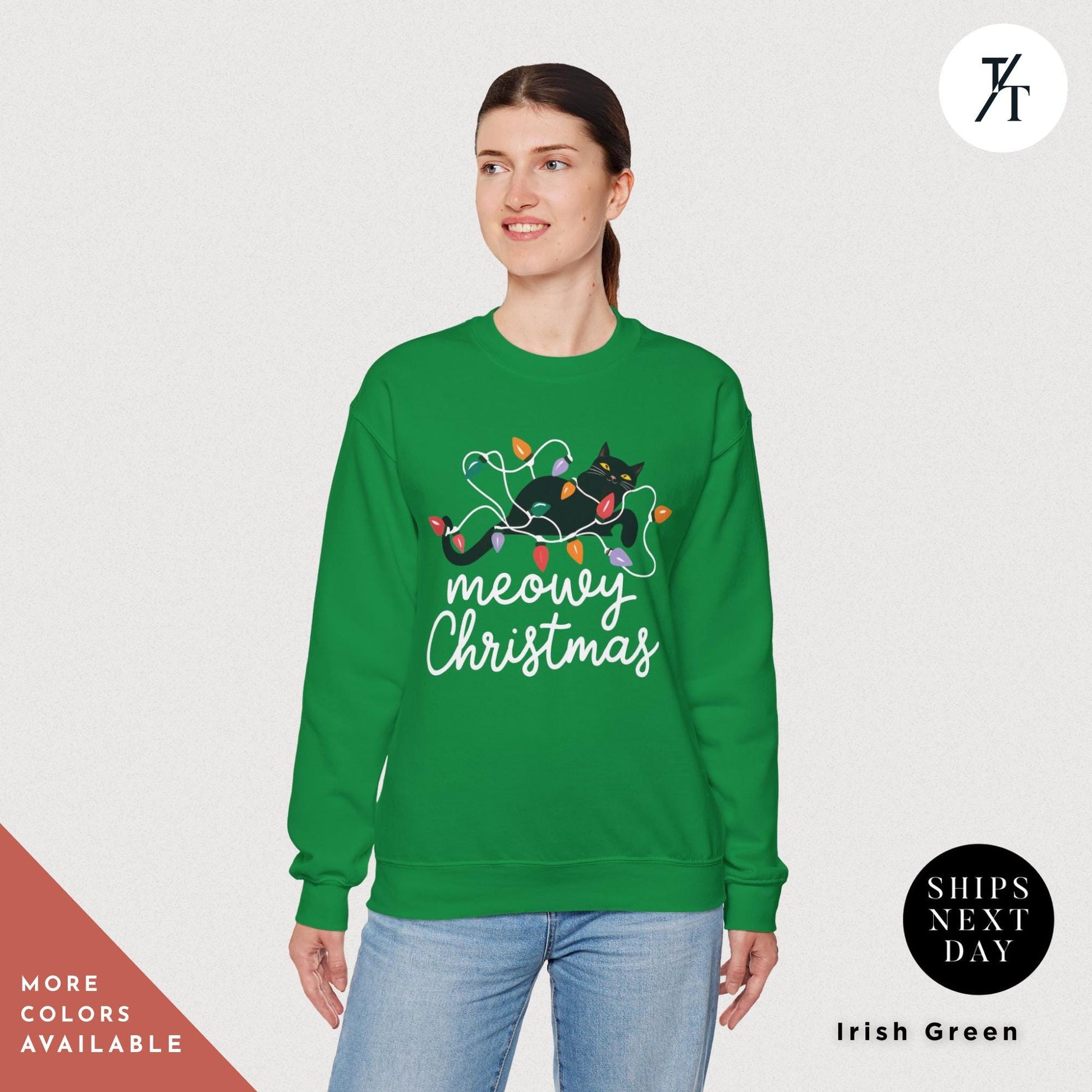 a woman wearing a green merry christmas sweatshirt, Meowy Christmas Sweater - Catmas Sweatshirt, Meowy Christmas Sweatshirt, Gift For Cat Mom, Cute Cat Mom Sweatshirts, Holiday Sweatshirts