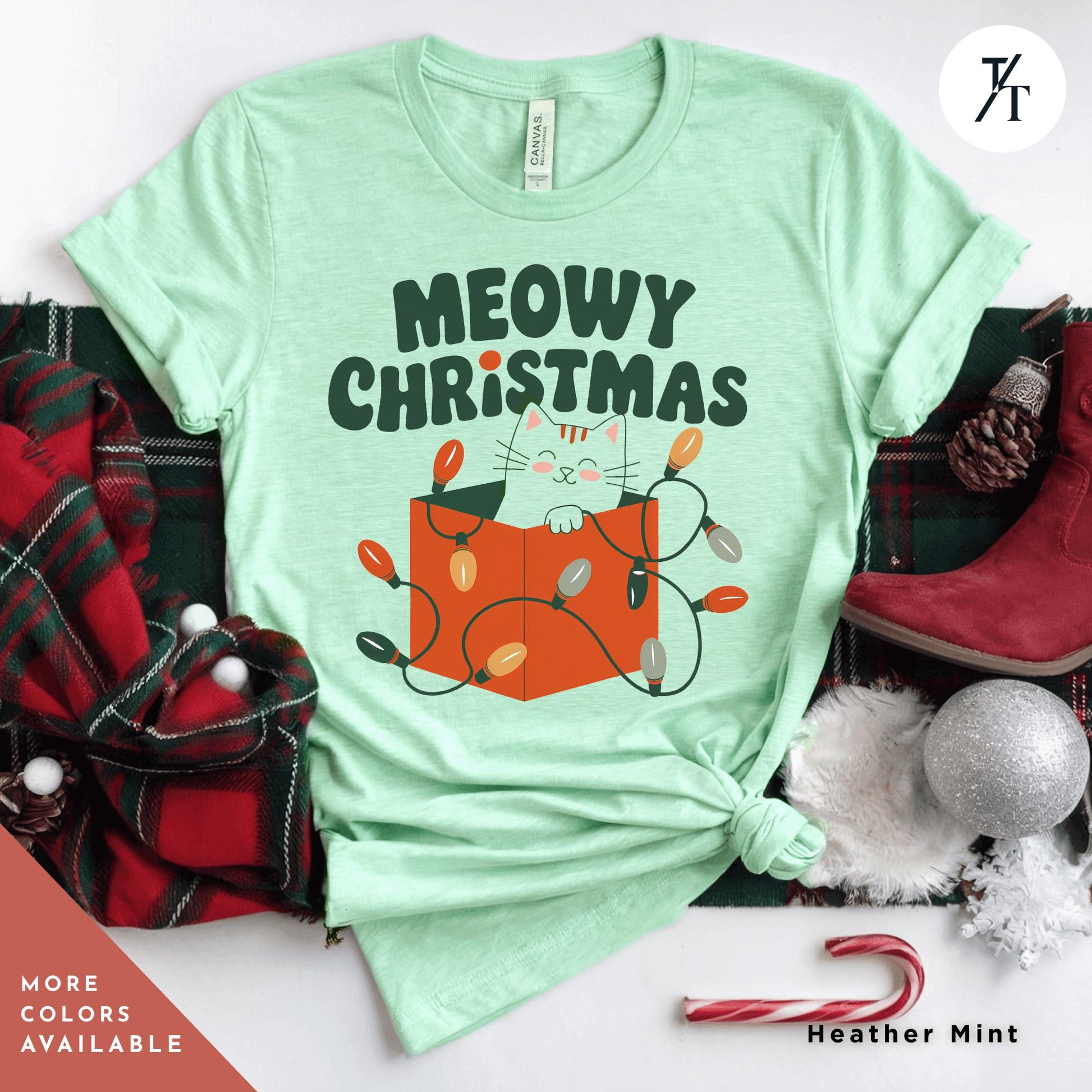 a green t - shirt with a cat on it that says meowy christmas, Meowy Christmas black cat christmas lights Shirt, Xmas Black Cats Shirt, Gift For Cat Lover Shirts, Gift For CatMom, Holiday Meowy Xmas Tee