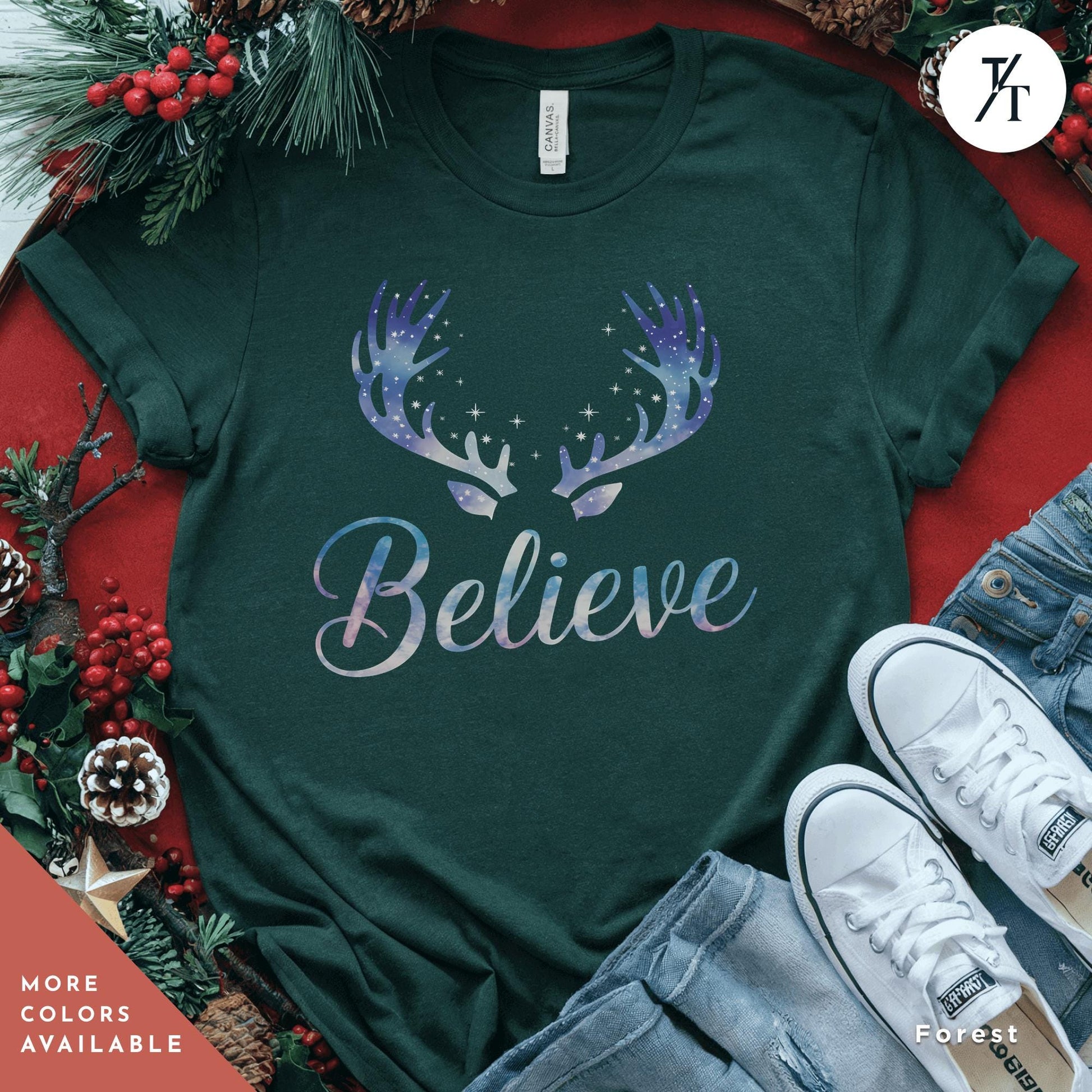 a t - shirt that says believe with antlers on it Believe in Miracles Santa Shirt, Christmas Miracle Reindeer Shirt, Merry Christmas Tee, Believer Tee, Santa Believe Shirts Believe Quote