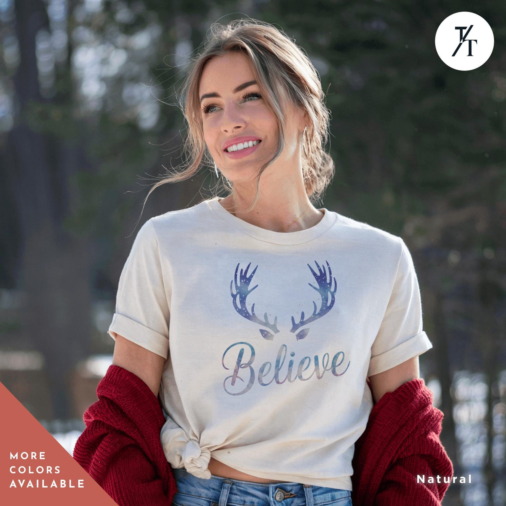 a woman wearing a white shirt with antlers on it Believe in Miracles Santa Shirt, Christmas Miracle Reindeer Shirt, Merry Christmas Tee, Believer Tee, Santa Believe Shirts Believe Quote