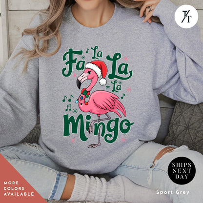 a woman wearing a sweatshirt with a pink flamingo wearing a santa hat, Flamingo Print Christmas Sweatshirt, Pink Flamingo Christmas, Flamingos Sweatshirt, Flamingos Lover Gift, Ugly Funny Crewneck Xmas Sweater