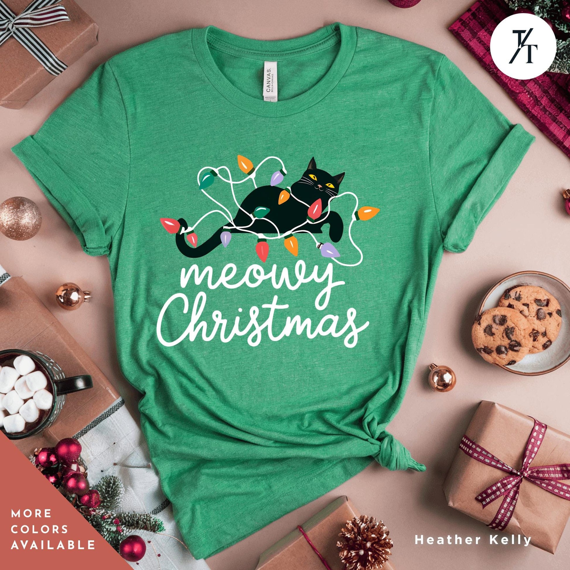 a green t - shirt with a black cat and merry christmas lights, Meowy Christmas black cat christmas lights Shirt, Xmas Black Cats Shirt, Gift For Cat Lover Shirts, Gift For CatMom, Holiday Meowy Xmas Tee