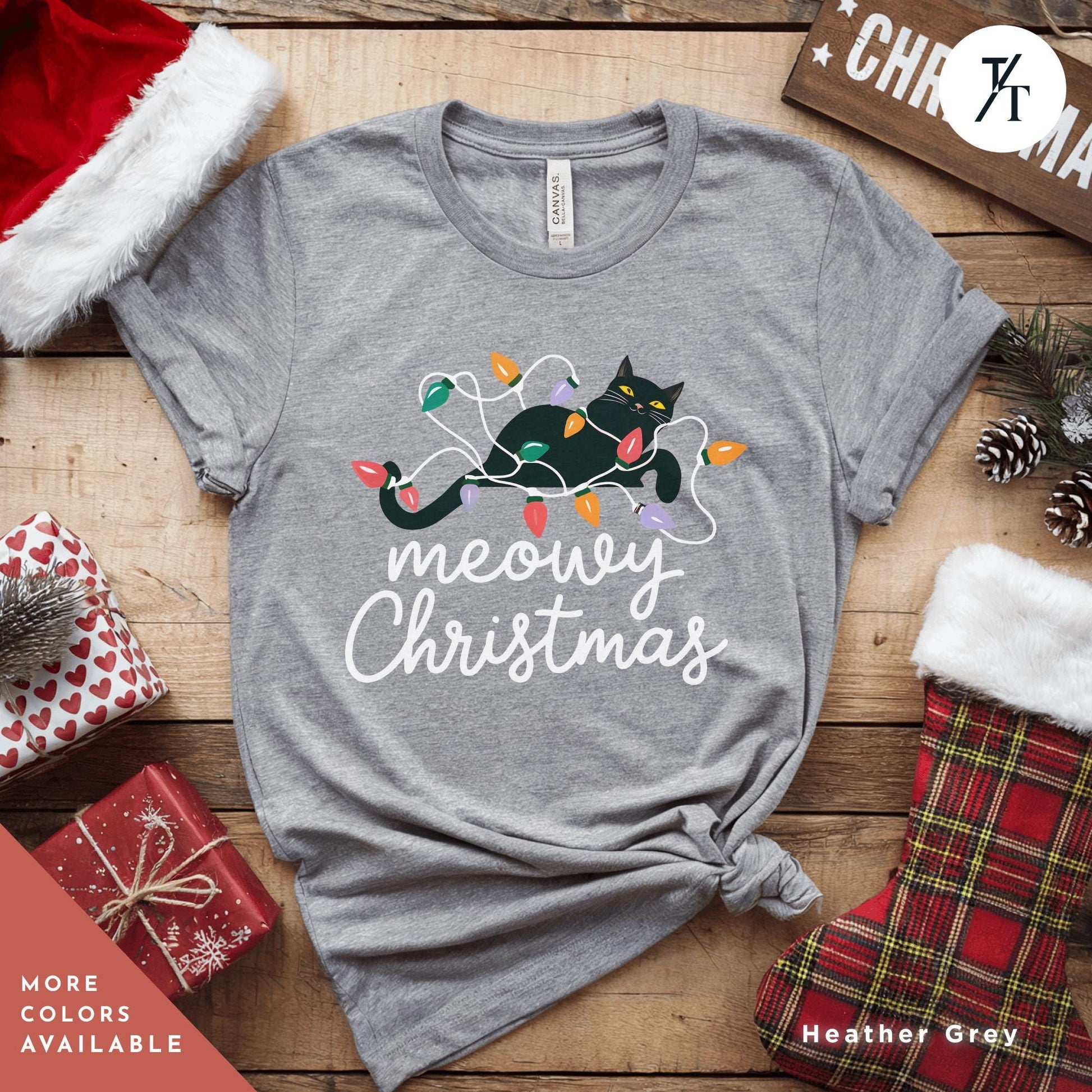 a t - shirt that says merry christmas with a cat on it, Meowy Christmas black cat christmas lights Shirt, Xmas Black Cats Shirt, Gift For Cat Lover Shirts, Gift For CatMom, Holiday Meowy Xmas Tee