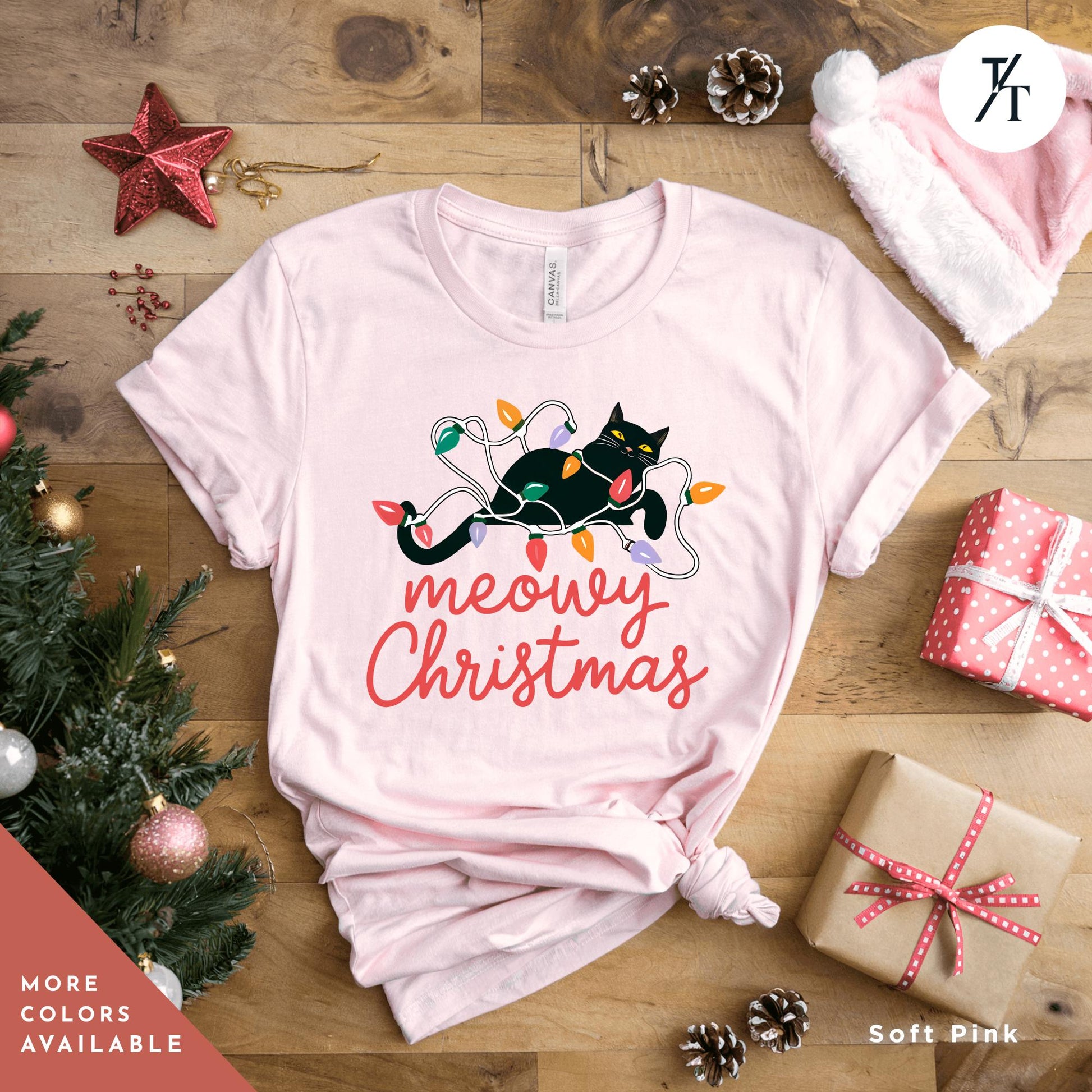 a pink t - shirt with a black cat and merry christmas lights, Meowy Christmas black cat christmas lights Shirt, Xmas Black Cats Shirt, Gift For Cat Lover Shirts, Gift For CatMom, Holiday Meowy Xmas Tee