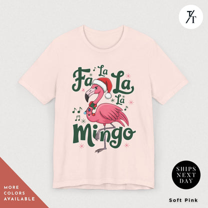 a pink shirt with a pink flamingo wearing a santa hat