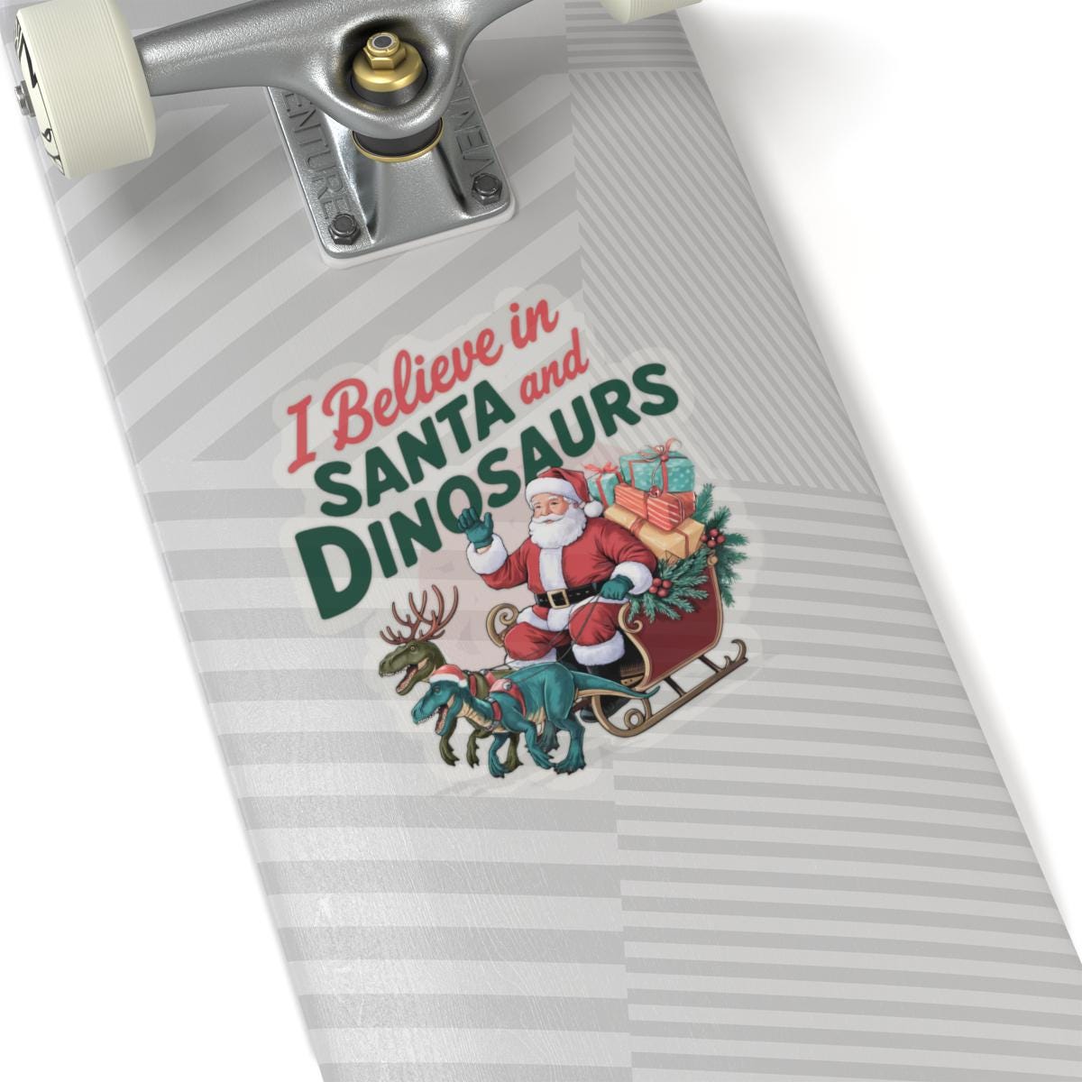 a close up of a skateboard with a santa clause on it, I believe in santa and dinosaurs christmas dinosaur decal, Dinosaur Christmas Vinyl Decal Xmas Sticker Dino Reindeers Xmas Stocking Stuffer