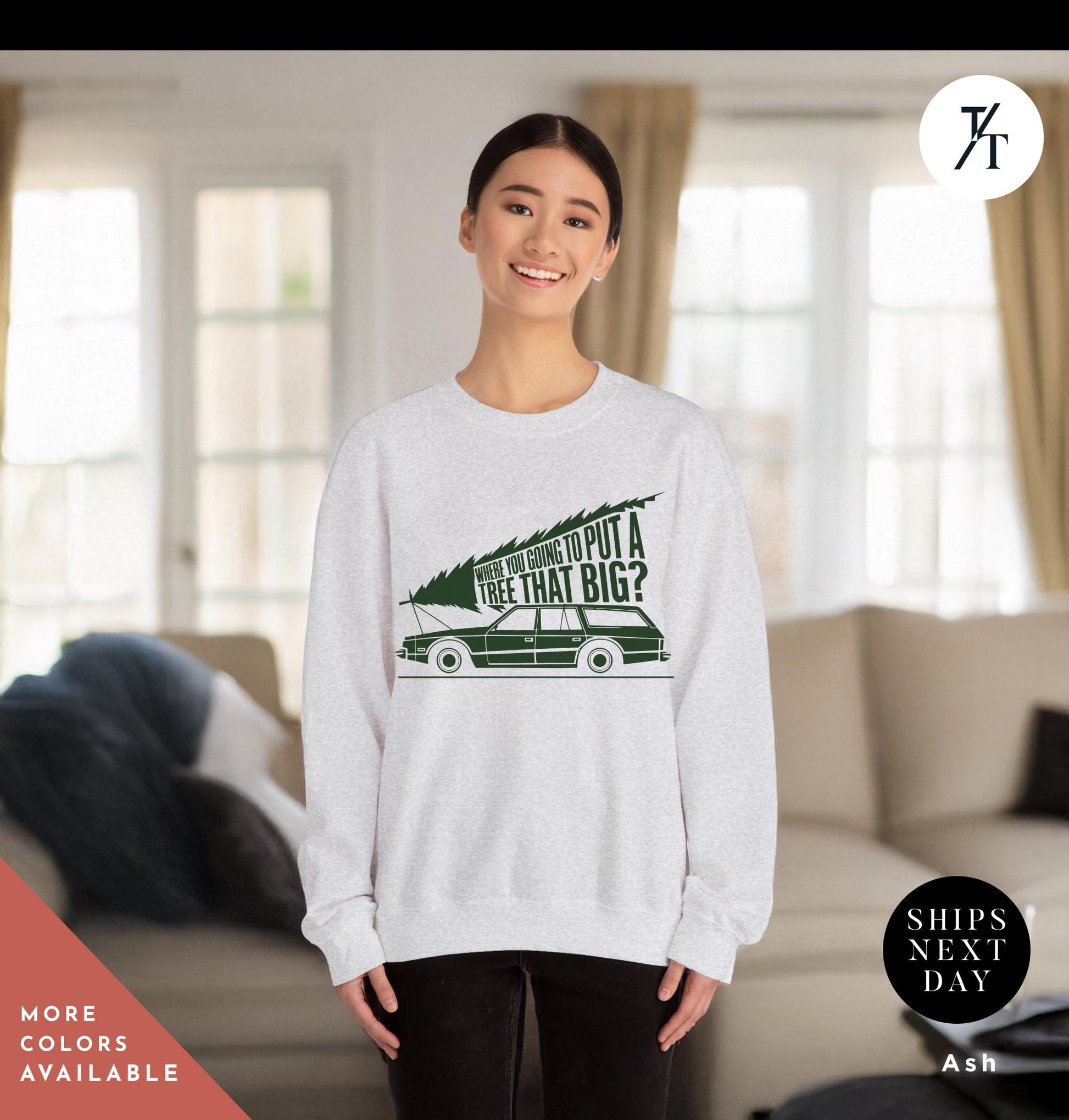 a woman standing in front of a couch wearing a sweatshirt, You&#39;Re Gonna Put A Tree That Big Unisex Sweatshirts, Funny Christmas Gift, Griswold Sweatshirt, Christmas Sweatshirts for Christmas Vacation