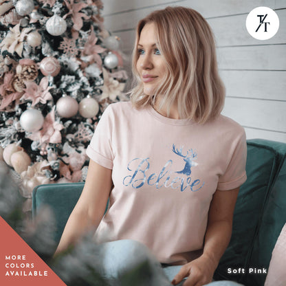a woman sitting on a couch in front of a christmas tree Believe in Miracles Santa Shirt, Christmas Miracle Reindeer Shirt, Merry Christmas Tee, Believer Tee, Santa Believe Shirts Believe Quote