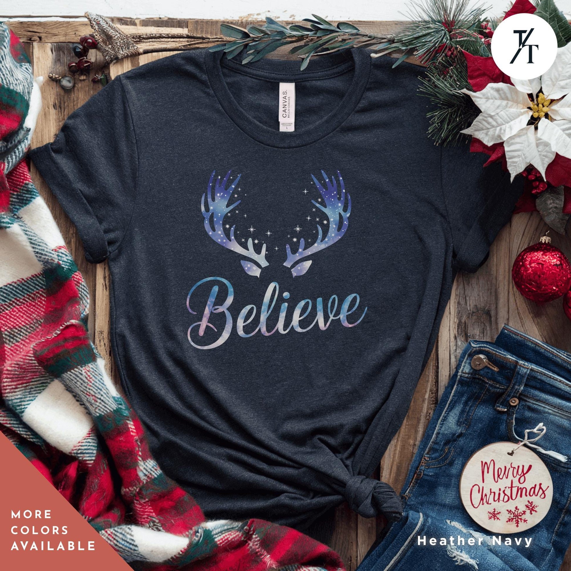 a t - shirt that says believe with a deer&#39;s antlers on it Believe in Miracles Santa Shirt, Christmas Miracle Reindeer Shirt, Merry Christmas Tee, Believer Tee, Santa Believe Shirts Believe Quote