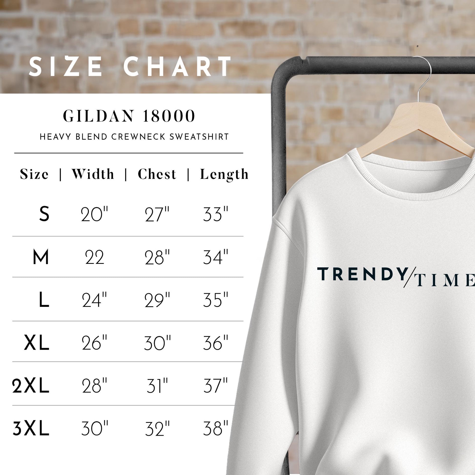 a white sweatshirt hanging on a rack next to a brick wall