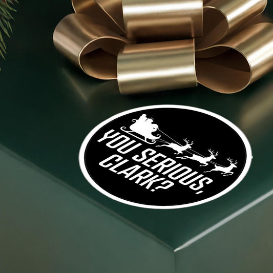 a green box with a gold bow and a sticker on it, National Lampoons Decal, Christmas Vacation stickers, Chevy Chase Stocking Stuffer, Funny You Serious Clark Christmas Vinyl Laptop Stickers