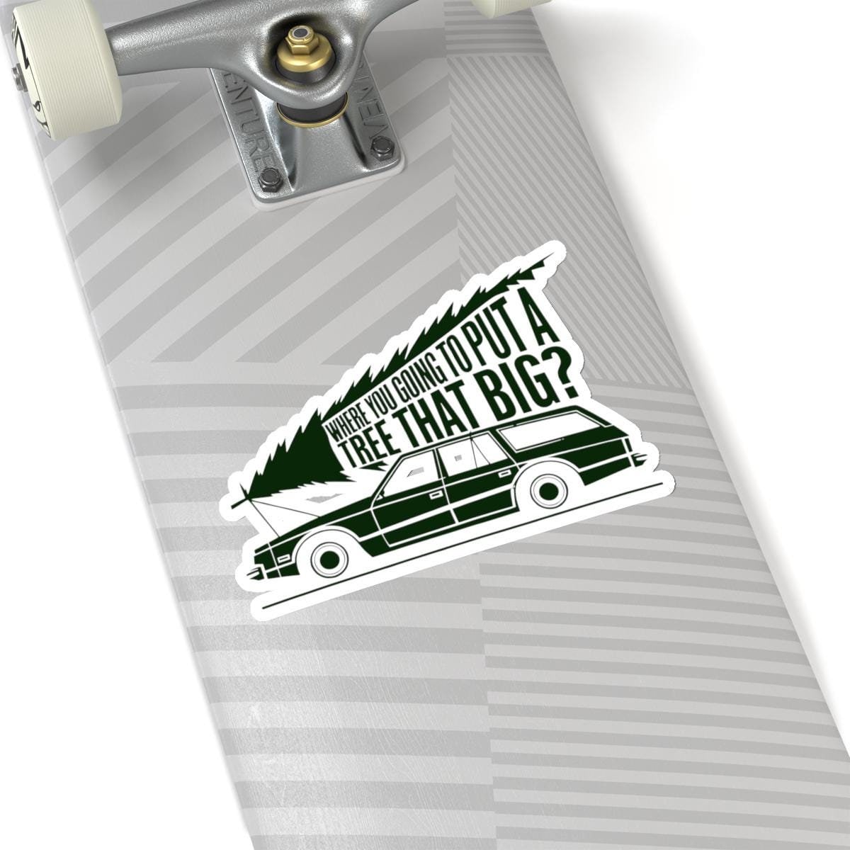 a skateboard with a sticker of a car on it, National Lampoons Decal, Christmas Vacation stickers, Chevy Chase Stocking Stuffer, Funny You Serious Clark Christmas Vinyl Laptop Stickers