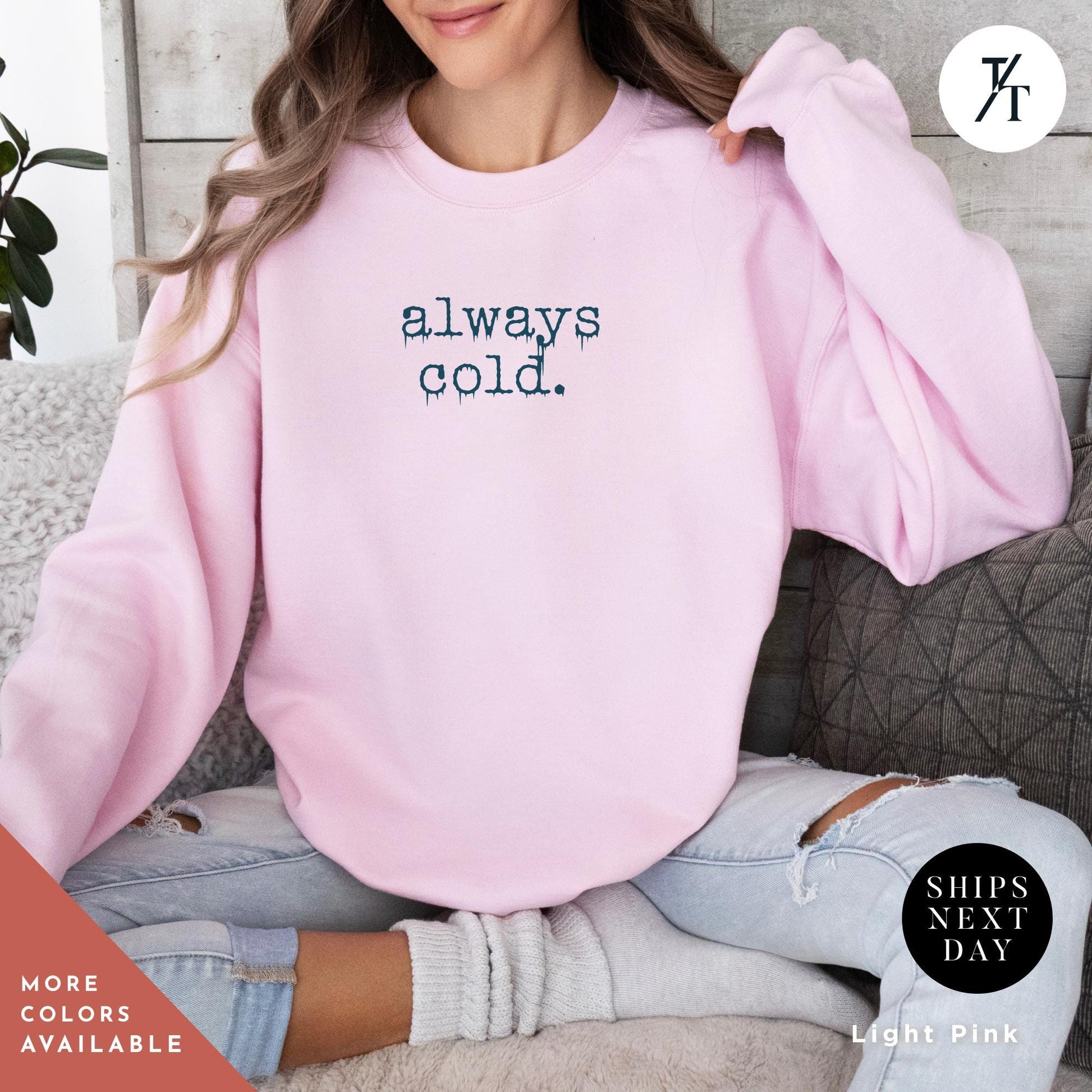 a woman sitting on a couch wearing a pink sweatshirt, Always Cold Sweatshirt, Funny Cold Winter Sweatshirt, womens winter gift, cute fall gift, christmas gift, winter graphic Holiday Sweatshirt