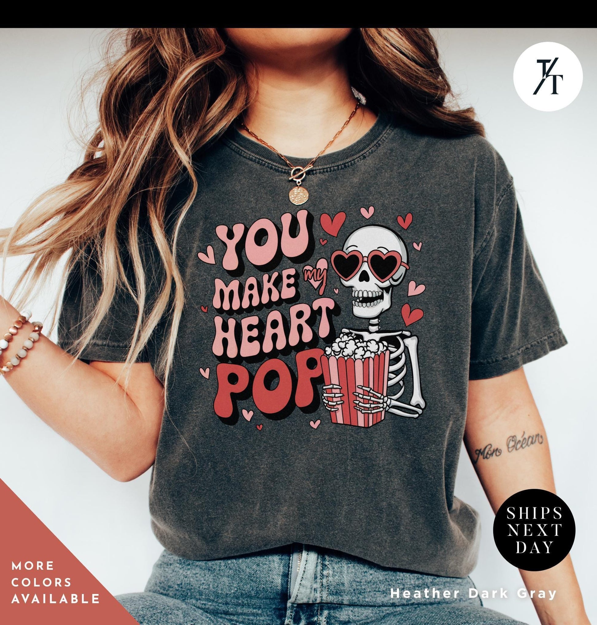 Woman wearing a shirt with a skeleton holding popcorn that says You Make My Heart Pop, Shirt Funny Skeleton Valentines Gift For Her, Retro Valentines Day Skeleton shirt, Heart Pops For You Valentine tee