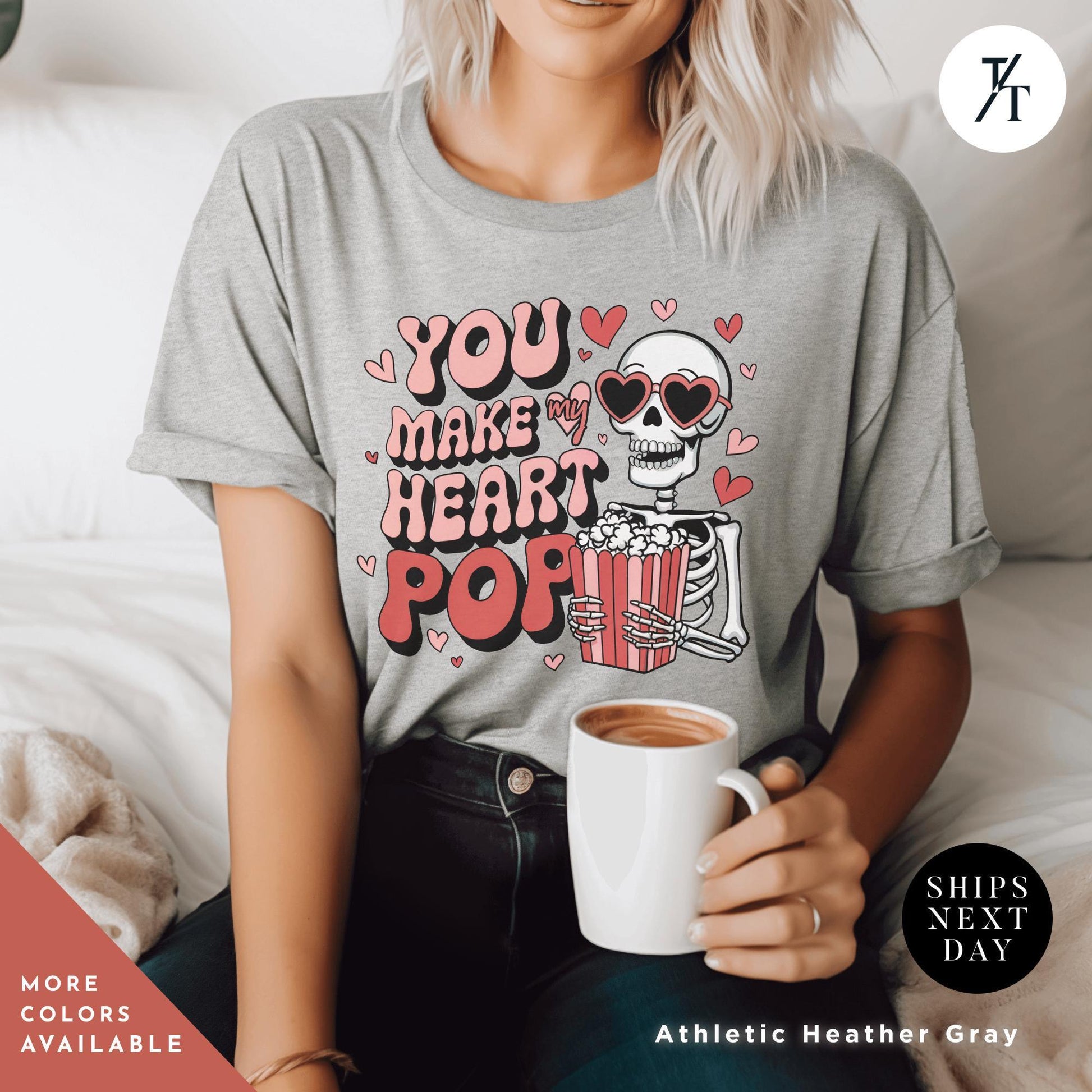 Woman wearing a shirt with a skeleton holding popcorn that says You Make My Heart Pop, Shirt Funny Skeleton Valentines Gift For Her, Retro Valentines Day Skeleton shirt, Heart Pops For You Valentine tee