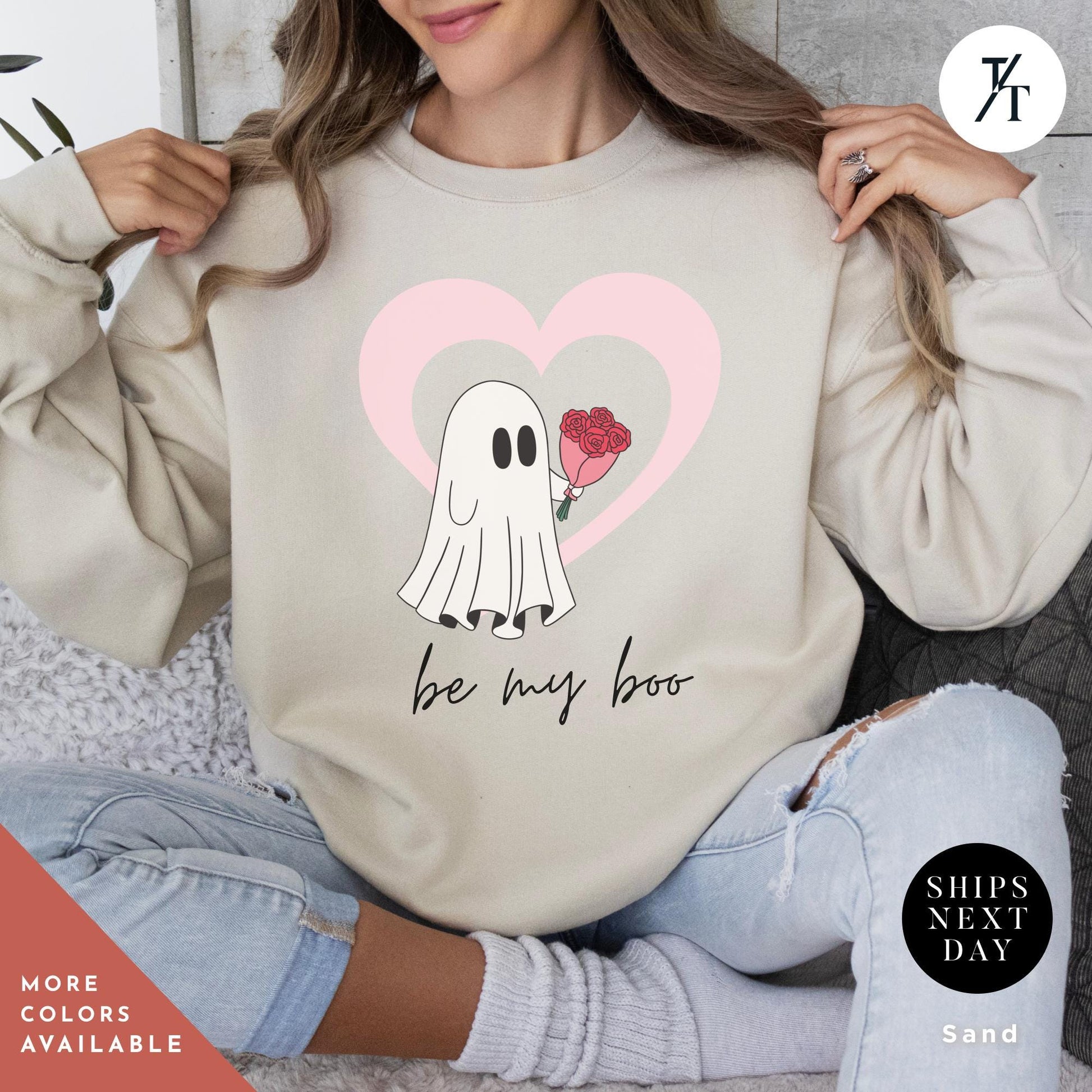 a woman wearing a sand sweatshirt with a picture ghost with roses that says Be My Boo Sweatshirt, ghost sweater, valentines day hoodie, Valentine Sweatshirt, Heart Sweatshirts, Ghost Sweater, Be Mine Sweatshirts Xoxo