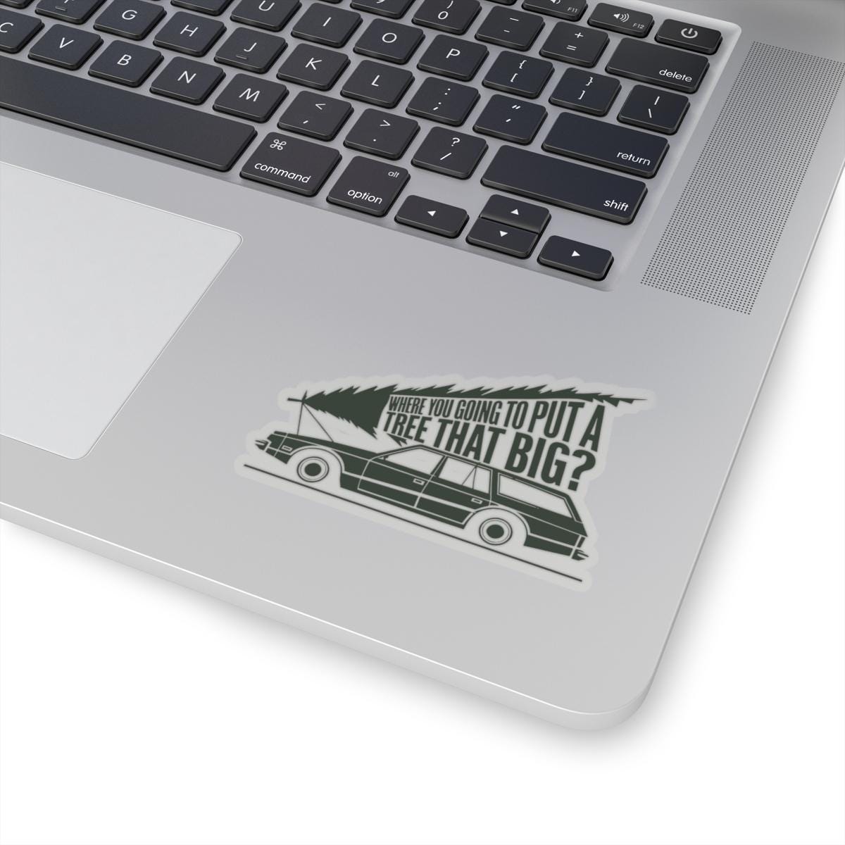 a laptop computer with a sticker on it, National Lampoons Decal, Christmas Vacation stickers, Chevy Chase Stocking Stuffer, Funny You Serious Clark Christmas Vinyl Laptop Stickers