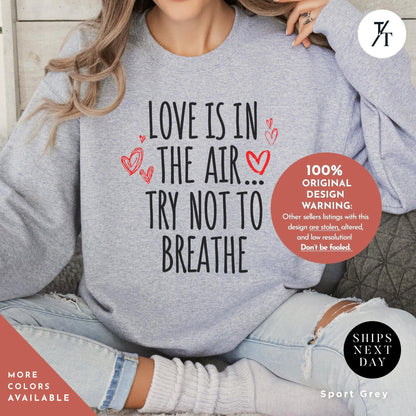 Love Is In The Air Try Not To Breath Sweatshirt, Anti Valentines Day tee, Funny Love sweater Perfect for Singles, Unique Gift Idea
